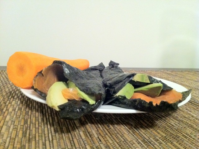 smoked salmon and avocado seaweed hand rolls with carrot